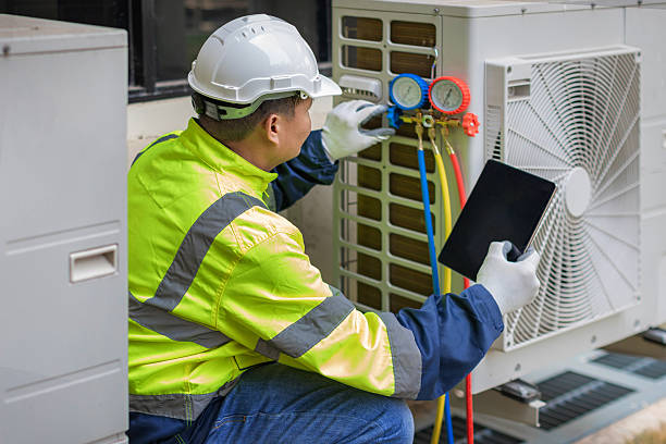 Professional Air Duct Cleaning technician working in Dana, IN